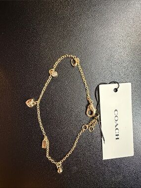 COACH Gold-Tone Heart Charm Bracelet